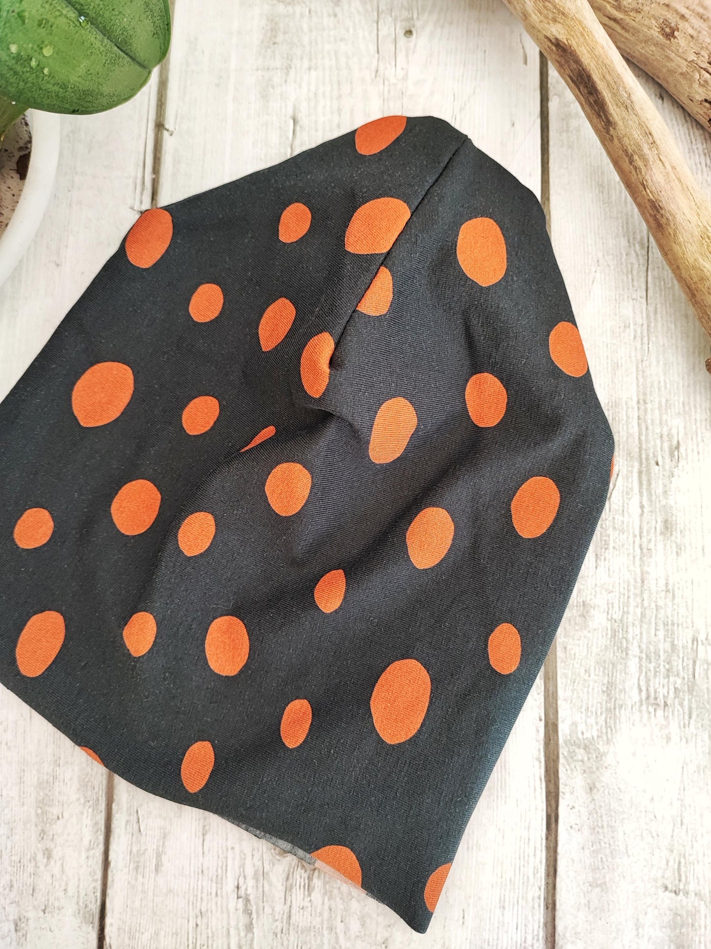 BERRETTO 2-4 ANNI | Nero con pois arancioni