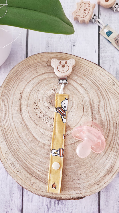 PORTA CIUCCIO | clip in legno naturale, catenella in tessuto di cotone con bottoncino automatico.